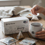 Person holding Heil Ginseng tea